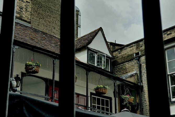 Creepy Cambridge - Cambridge's Most Entertaining Ghost Walk - St Bene’t’s Church and the open pub window