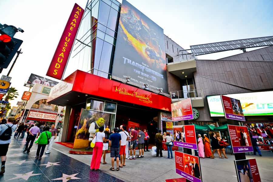Hollywood: Fame Kills Adults-Only Walking Ghost Tour - Meeting beneath the Madame Tussauds neon sign