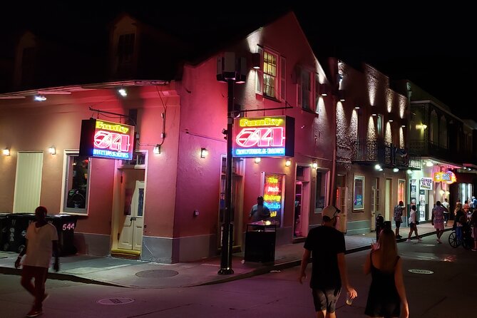New Orleans Lewd Spirits Haunted Tour with Bar Stops - Walking the French Quarter between drinks