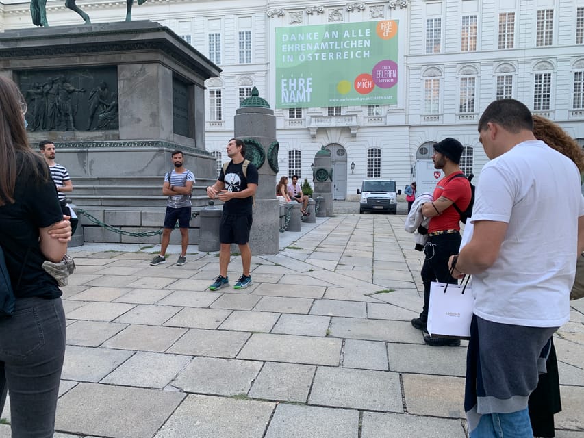 Private Spooky Vienna Tour - Meeting under the red-and-white umbrella
