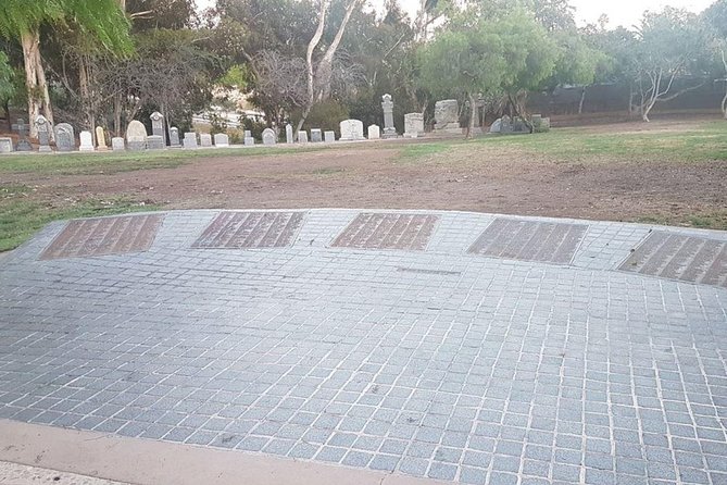 San Diego Ghosts and Gravestones: A Haunted Trolley Tour - Walking through El Campo Santo Cemetery